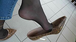 Isabelle-Sandrine's balcony show in snake skin stilettos