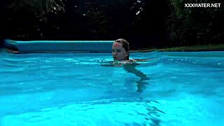 Irina Cage, half Russian-Spanish, swims nude underwater in cage