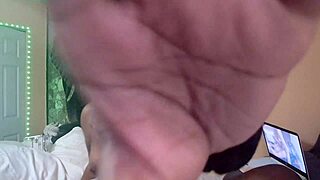 Naejae sits alone, rubbing her wet twat while watching hot lesbian porn on her screen.