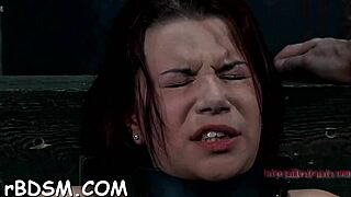 Who wins the contest when the gagged girl gets her clit pleasured?