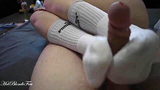 Sexy Blonde Miley Grey Gives Intense Footjob In Long Socks