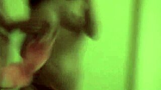 Two teen lesbians play with a camera in the bedroom