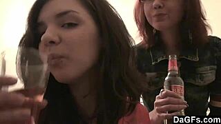 Two teen lesbians play with a camera in the bedroom