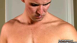 angry gay hunk strokes cock and cums on sofa