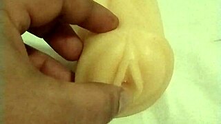 I played with the artificial pussy, fingering and fucking it like a doll.