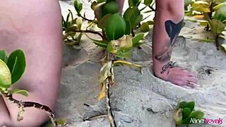 hey, wanna see this blonde beach babe bang her fan hard?