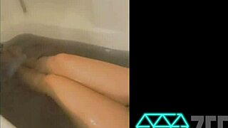 tattooed slut teases with buttplug in social media clips. her pierced assplay drives fans wild.