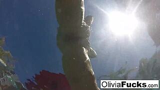 Olivia enjoys a refreshing summer day by the pool with friends.