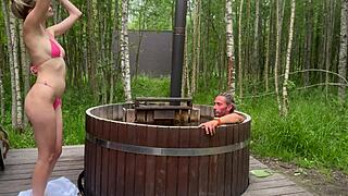 skinny blonde gets wild in hot bath outdoor sex