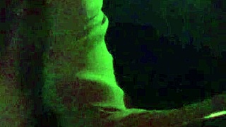 Artemisia Love flashes big tits during night car ride.