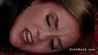 Chained lesbian sub takes anal strap-on deep