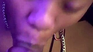 This pretty ebony couple engages in sex, licking, and a big cumshot facial
