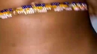 Amateurs engage in foreplay in the bedroom