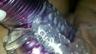 A Latina woman explores her interests with toys