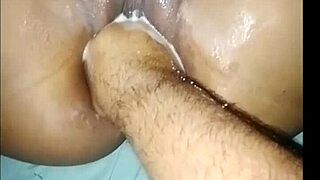 Watch this amateur couple attempt huge fisting insertion!