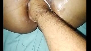 Watch this amateur couple attempt huge fisting insertion!