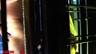 Pornstar brunette engages in group blowjobs and facials in neon dungeon