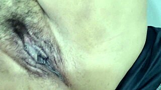 This brazilian amateur's big hairy pussy and ass lead to intense orgasms.