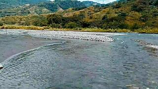 Latina Couple Shares Passionate Moment Outdoors In Nature.