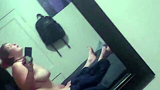 Amandgreg0326 videos captured in the mirror.