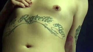 Clockwork Bleu, tattooed british beauty, bathes seductively in usa