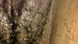 Ebony plays with wet pussy using vibrator