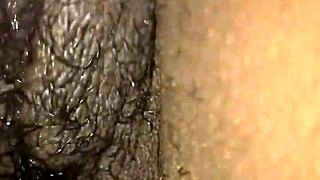 Ebony plays with wet pussy using vibrator