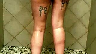 big ass sways seductively in the shower, moving under the water