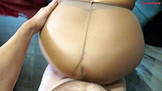 hubby films wife in kitchen