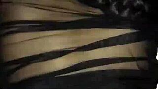 couple participates in group swingers gathering