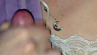 Skinny milf jerks cock and licks up every drop