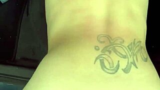 Busty hooker rides reverse cowgirl in car!