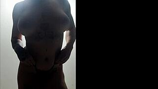 brazilian babe with tattoos rips clothes in striptease