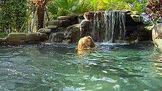 Blonde lesbian babes heat up by the poolside