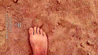 Bare feet playing in sand for sensory purposes, barefeet fetish