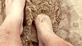 Bare feet playing in sand for sensory purposes, barefeet fetish