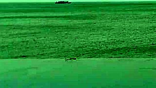 skinny student with cute legs relaxes by the infinity pool