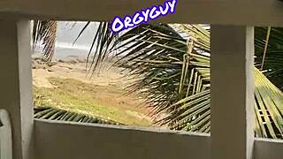 Woman flashes at beach resort outdoors