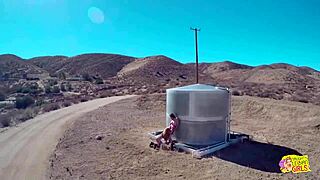 Outdoors, brunette and blonde lesbians lick tight pussies and trib