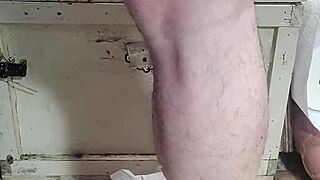 Mature woman stretches with huge dildos