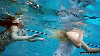 two teen blondes having sex in the pool underwater