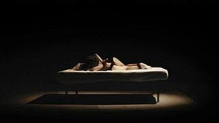 Master punishes submissive in rough bondage threesome.