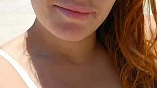 african woman flashes big pussy lips to excite her beach lover