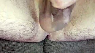 Huge Uncircumcised Cock Jerked Off to Orgasm with Cum Swapping