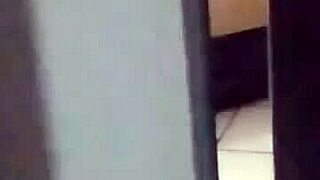 Hidden camera catches crossdressing couple in intense anal sex at the Gramado inn with door wide open!