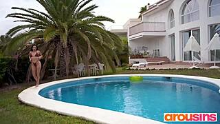 Curly cute babe Helina Dream fingers juicy shaved pussy in outdoor pool solo