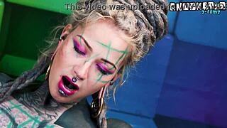 so this inexperienced tattooed hippie girl is getting an anal lesson from an alternative pornstar with strapon and fingering in a goth punk vibe