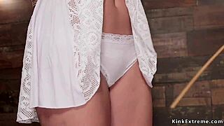 Brunette slave bound hogtied spread pussy fingered roughly in bondage session. Fetish domination unfolds.