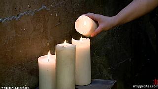 Dyke slave with big tits bound in bondage for ass spanking and whipping in lezdom fetish