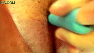 Pretty milf's tight pussy teased with vibrator in close-up
